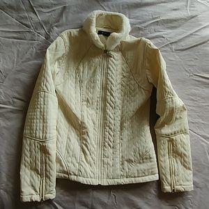 Cream colored jacket with detail on collar